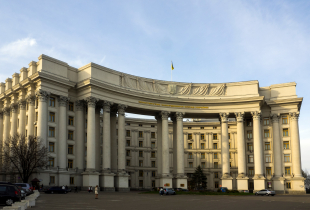 A photograph of the Exterior of the Verkhovna Rada building is located in the center of Kiev, the Pecherskyi District. It is the place where the Ukrainian parliament (Verkhovna Rada) meets for all regular and ceremonial sessions.