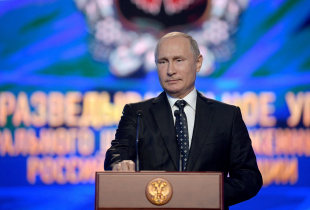 Russia's President Vladimir Putin addresses an event marking the 100th birthday of the Main Directorate of the Russian Armed Forces' General Staff at the Russian Army Theatre on Day of Military Intelligence Officer. 