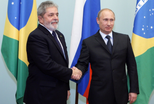 Russian Prime Minister Vladimir Putin (R) greets Brazilian PresidentLuis Inacio Lula da Silva during their meeting on May 14, 2010 in Moscow.