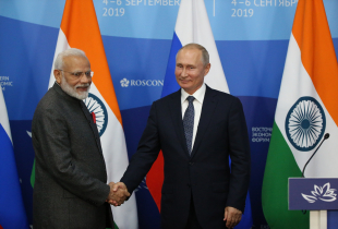 Russian President Vladimir Putin (R) shakes hands with Indian Prime Minister Narendra Modi (L) during the signing ceremony after their talks at the Russky Island in Vladivostok, Russia, September,4,2019.