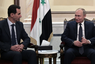 Russian President Vladimir Putin and Syrian President Bashar al-Assad hold a meeting in Damascus on January 7, 2020. - Putin met his Syrian counterpart Bashar al-Assad during an unprecedented visit to Damascus as the prospect of war between Iran and the United States loomed over the region.