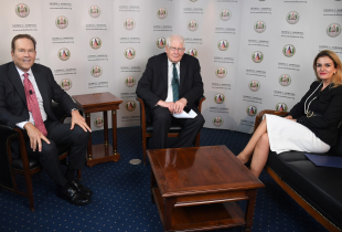 Vern Buchanan, David Price, Valbona Zeneli engaged in a discussion