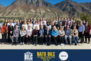 Group photo of NATO BILC participants in front of Y Mountain