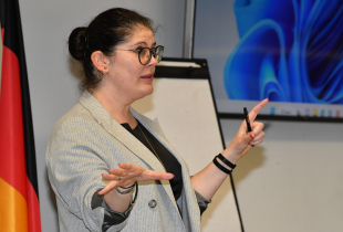 Kseniya Sotnikova gives Alumni Scholar presentation