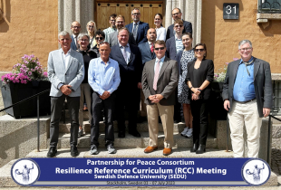 PfPC Resilience Reference Curriculum Meeting participants in front of Swedish Defence University building