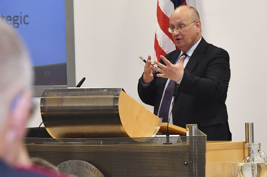 A photograph of Paul Dunay lecturing during the European Security Seminar, 19-03.