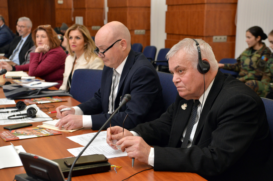 Moldovan alumni listen in during an outreach networking event