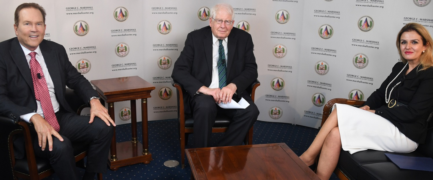 Vern Buchanan, David Price, Valbona Zeneli engaged in a discussion